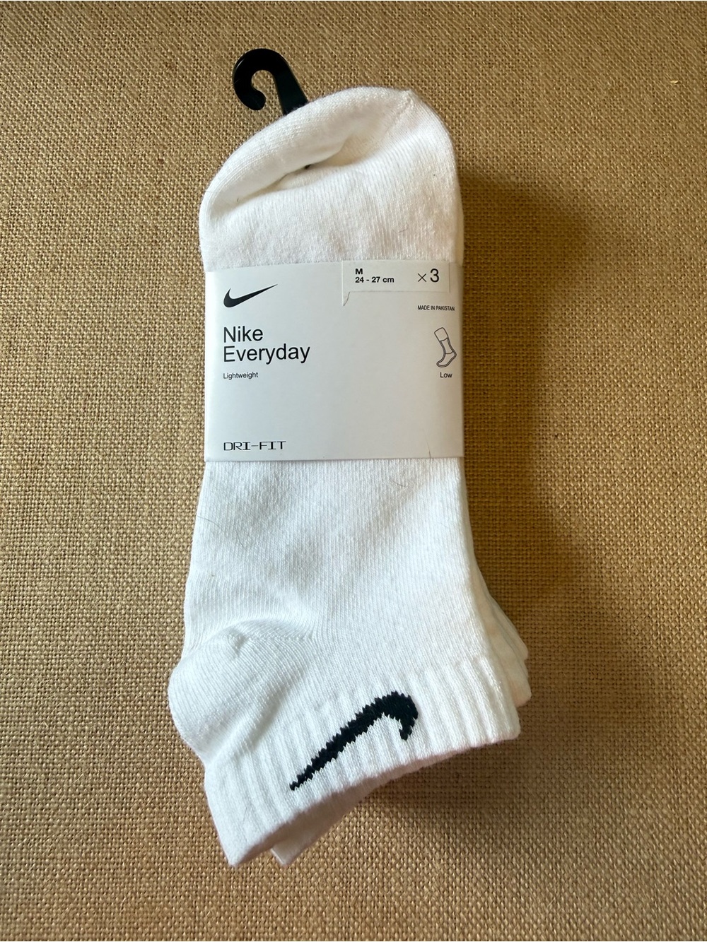 Nike White Low-Cut Athletic Socks with Black Swoosh (3 Pack)